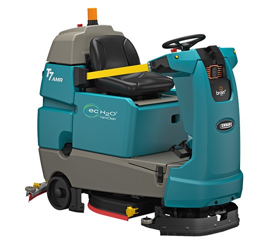 A Tennant T7AMR ride-on floor scrubber